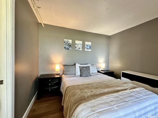 261 Quaking Aspen Ln Unit B, Stateline, NV 89449 - bedroom featuring dark wood-style flooring and baseboards