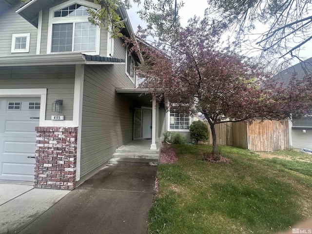 495 Len Cir, Reno, NV 89511 - view of front of house with an attached garage
