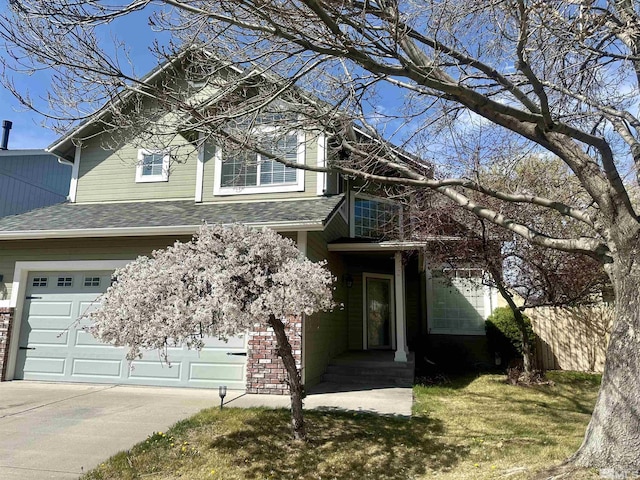 495 Len Cir, Reno, NV 89511 - traditional-style home featuring driveway, an attached garage, fence, roof with shingles, and brick siding