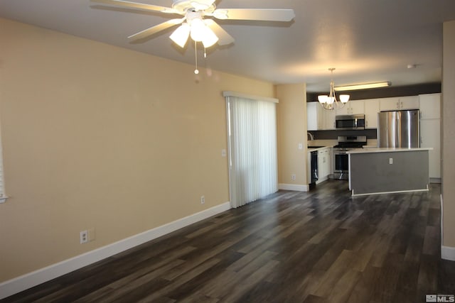 495 Len Cir, Reno, NV 89511 - living room with a chandelier, dark wood-type flooring, baseboards, and ceiling fan