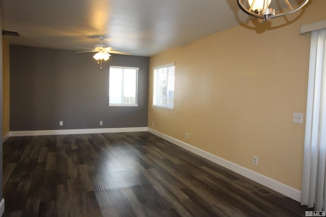 495 Len Cir, Reno, NV 89511 - spare room with ceiling fan, baseboards, a chandelier, and dark wood-style flooring