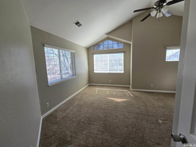 495 Len Cir, Reno, NV 89511 - unfurnished room with healthy amount of natural light, a ceiling fan, carpet flooring, baseboards, and high vaulted ceiling