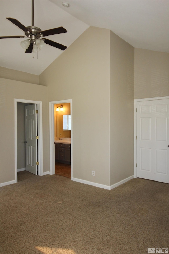 495 Len Cir, Reno, NV 89511 - unfurnished bedroom with high vaulted ceiling, carpet, baseboards, and ensuite bathroom