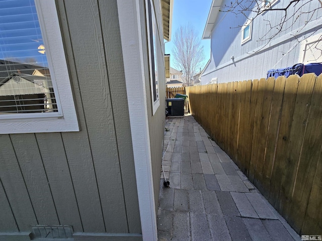 495 Len Cir, Reno, NV 89511 - view of side of property featuring fence and central AC unit