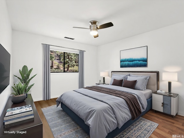 449 Andria Dr, Stateline, NV 89448 - bedroom featuring wood finished floors, baseboards, and ceiling fan