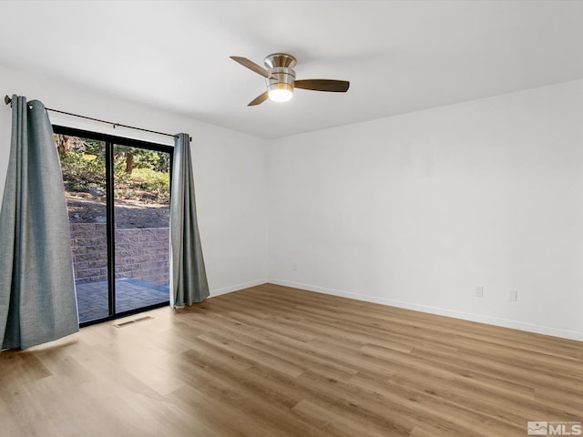 449 Andria Dr, Stateline, NV 89448 - empty room featuring light wood-type flooring, ceiling fan, and baseboards