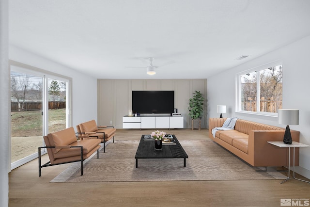 3575 Gull St, Reno, NV 89508 - living room with light wood-style flooring and a ceiling fan