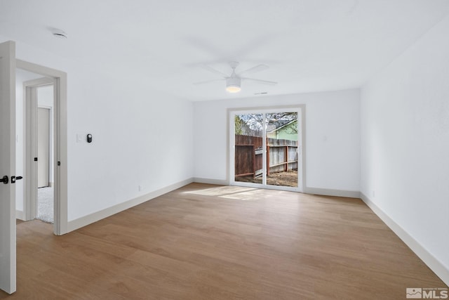 3575 Gull St, Reno, NV 89508 - unfurnished room with light wood-style flooring, a ceiling fan, and baseboards