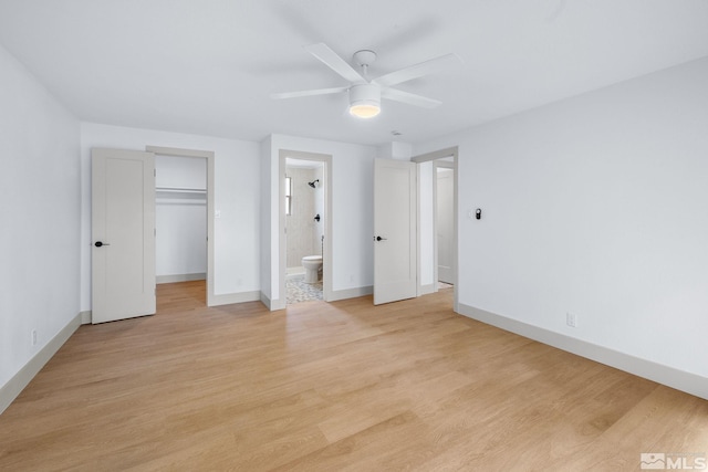 3575 Gull St, Reno, NV 89508 - unfurnished bedroom featuring light wood-style floors, baseboards, a spacious closet, and ensuite bathroom