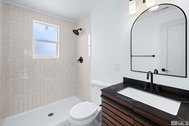 3575 Gull St, Reno, NV 89508 - full bath featuring toilet, a tile shower, and vanity