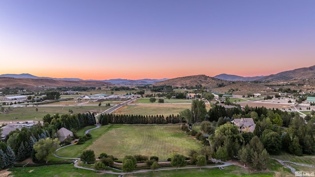 1185 Paddock Ln, Reno, NV 89521 - aerial view at dusk of a mountain view and a view of rural / pastoral area