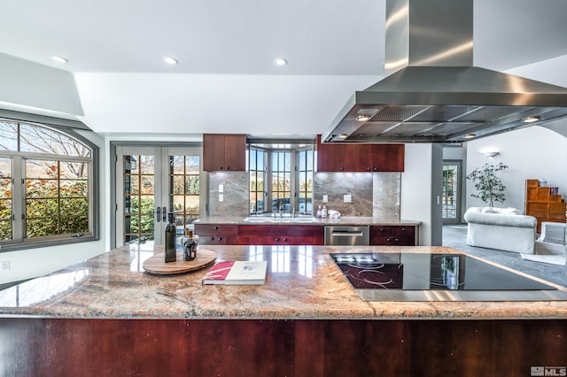 1185 Paddock Ln, Reno, NV 89521 - kitchen with island range hood, black electric stovetop, stainless steel dishwasher, a sink, and french doors
