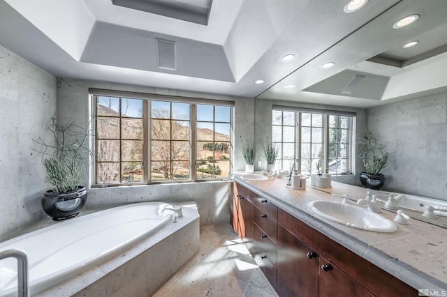 1185 Paddock Ln, Reno, NV 89521 - bathroom featuring plenty of natural light, a raised ceiling, double vanity, and recessed lighting