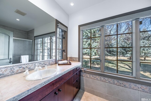 1185 Paddock Ln, Reno, NV 89521 - bathroom with vanity, a stall shower, tile patterned flooring, and recessed lighting