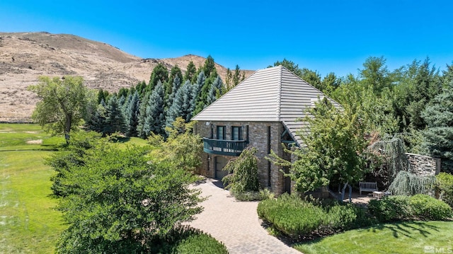 1185 Paddock Ln, Reno, NV 89521 - view of side of property featuring brick siding and a yard
