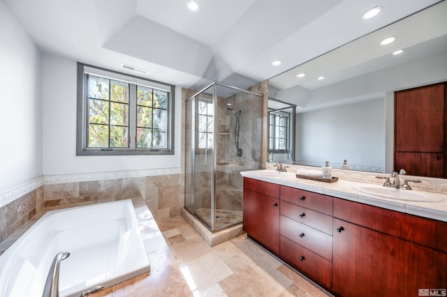 1185 Paddock Ln, Reno, NV 89521 - bathroom with recessed lighting, a shower stall, a garden tub, and double vanity