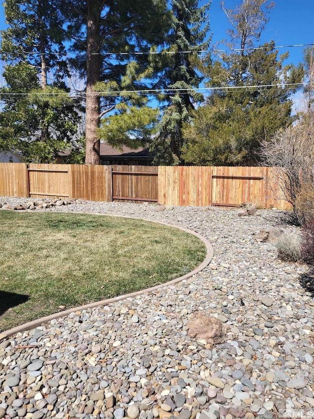 828 W Washington St, Carson City, NV 89703 - view of yard featuring a patio area