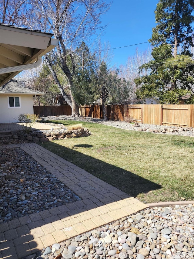828 W Washington St, Carson City, NV 89703 - view of yard featuring a patio