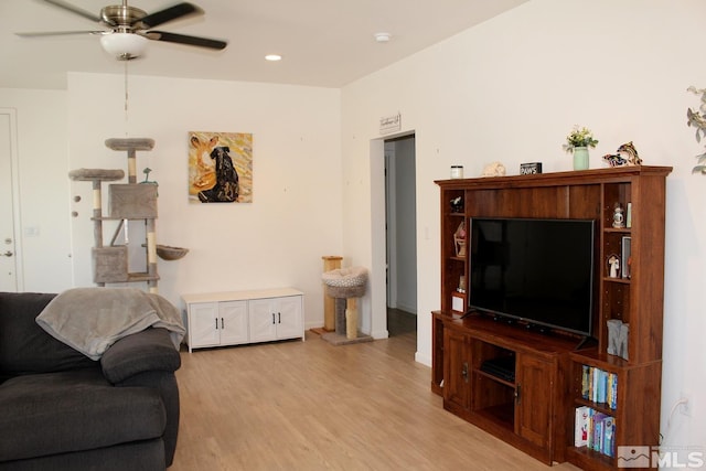 1332 Serenity Cir, Fernley, NV 89408 - living room featuring light wood-style floors, a ceiling fan, recessed lighting, and baseboards