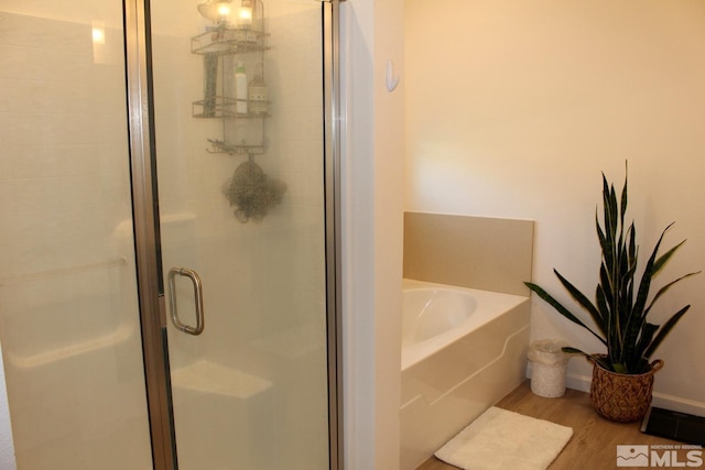 1332 Serenity Cir, Fernley, NV 89408 - full bathroom with a garden tub, wood finished floors, and a stall shower