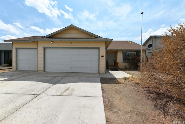 2129 Fort Bridger, Fernley, NV 89408 - ranch-style home featuring driveway and an attached garage