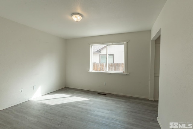 2225 Figoni Ranch Rd, Sparks, NV 89434 - spare room featuring wood finished floors and baseboards