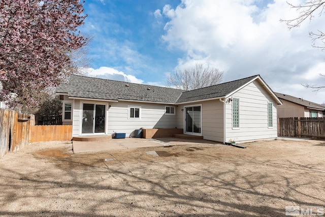 2225 Figoni Ranch Rd, Sparks, NV 89434 - back of house with a patio area, a fenced backyard, and a shingled roof