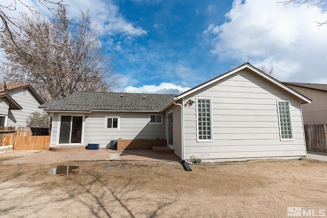 2225 Figoni Ranch Rd, Sparks, NV 89434 - rear view of house featuring a patio area and fence