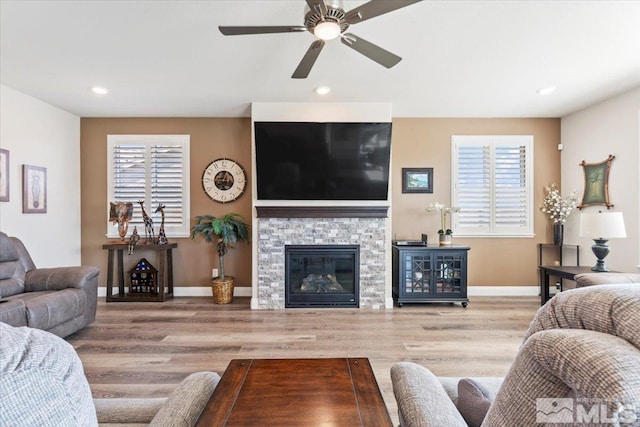 908 Sand Springs Dr, Sparks, NV 89441 - living room featuring baseboards, healthy amount of natural light, ceiling fan, wood finished floors, and recessed lighting