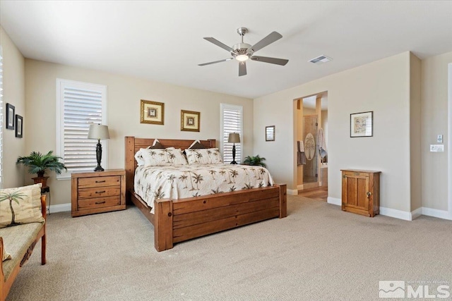 908 Sand Springs Dr, Sparks, NV 89441 - bedroom with light colored carpet, baseboards, and a ceiling fan