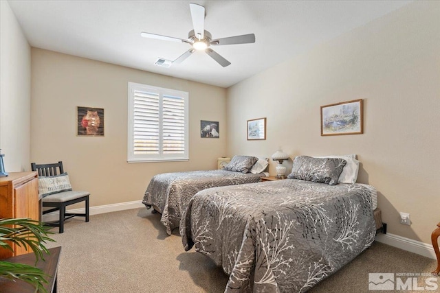908 Sand Springs Dr, Sparks, NV 89441 - bedroom with light colored carpet, baseboards, and ceiling fan