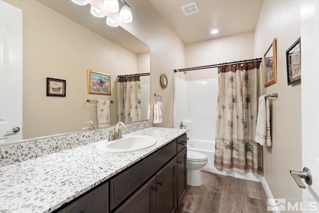 908 Sand Springs Dr, Sparks, NV 89441 - full bath featuring wood finished floors, vanity, shower / bathtub combination with curtain, and toilet