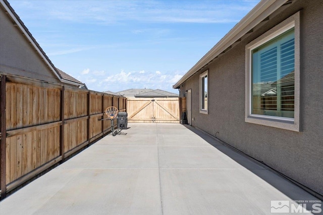 908 Sand Springs Dr, Sparks, NV 89441 - view of patio / terrace featuring fence and a gate