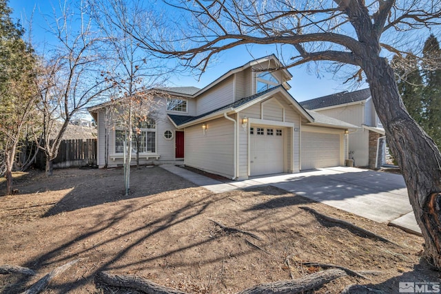2510 Wolf Creek Dr, Reno, NV 89523 - traditional home with fence, a garage, and driveway