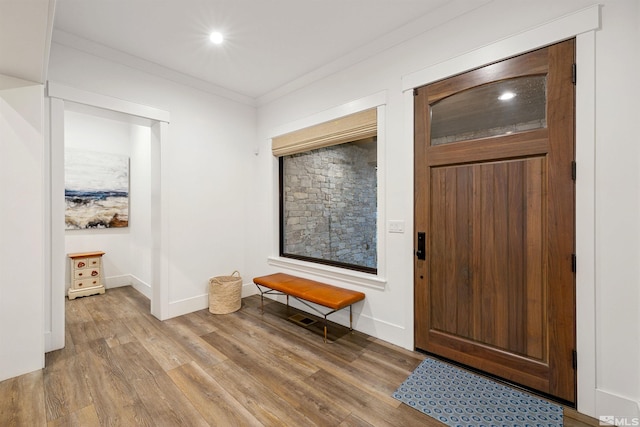 4312 Beaujolais St, Reno, NV 89511 - entrance foyer featuring light wood-style floors, crown molding, baseboards, and recessed lighting