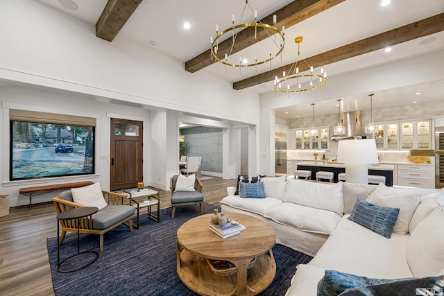4312 Beaujolais St, Reno, NV 89511 - living room with a chandelier, wood finished floors, beamed ceiling, baseboards, and recessed lighting