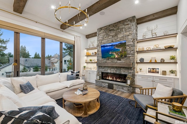 4312 Beaujolais St, Reno, NV 89511 - living area featuring beam ceiling, wood finished floors, a chandelier, and a stone fireplace