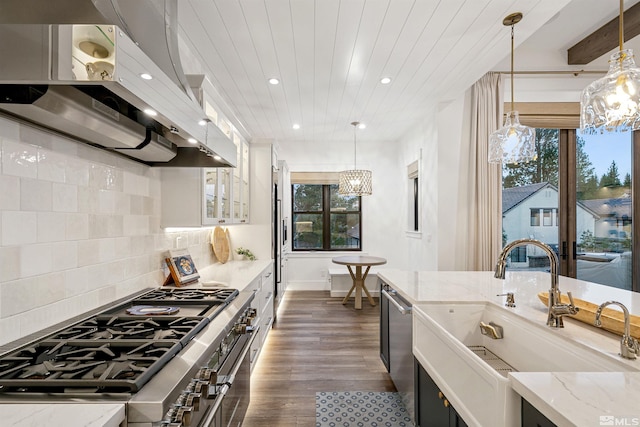 4312 Beaujolais St, Reno, NV 89511 - kitchen featuring under cabinet range hood, a sink, appliances with stainless steel finishes, a chandelier, and recessed lighting