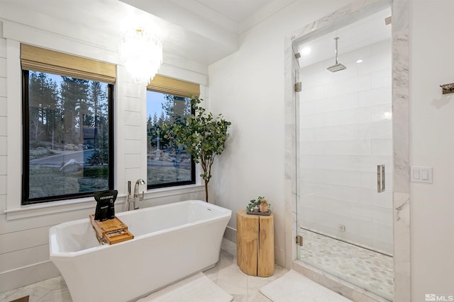 4312 Beaujolais St, Reno, NV 89511 - full bathroom with marble finish floors, a stall shower, and a soaking tub