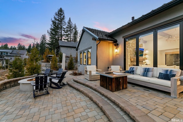 4312 Beaujolais St, Reno, NV 89511 - patio terrace at dusk with an outdoor living space with a fire pit