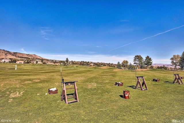 4312 Beaujolais St, Reno, NV 89511 - view of property's community featuring a lawn and a mountain view