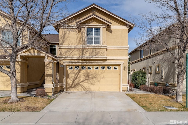 1853 Resistol Dr, Reno, NV 89521 - traditional-style home with stucco siding, concrete driveway, and an attached garage