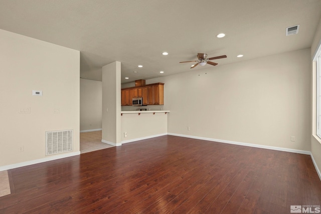 1853 Resistol Dr, Reno, NV 89521 - unfurnished living room featuring recessed lighting, a ceiling fan, wood finished floors, and baseboards