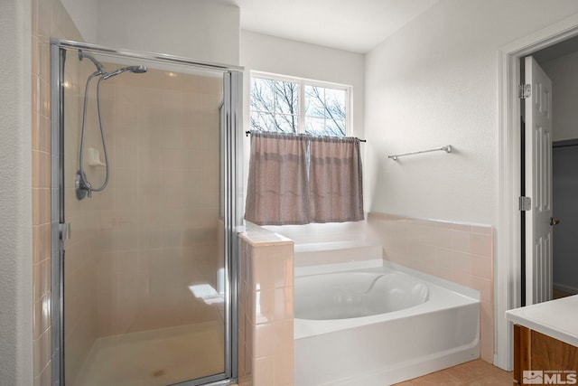 1853 Resistol Dr, Reno, NV 89521 - full bathroom with a stall shower, a bath, and vanity