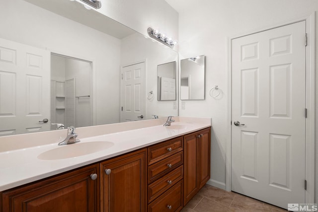 1853 Resistol Dr, Reno, NV 89521 - bathroom featuring double vanity and tile patterned flooring