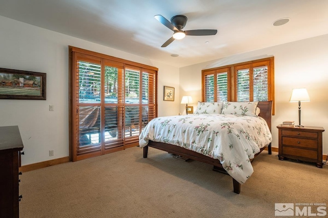 2147 The Back Rd, Glenbrook, NV 89413 - carpeted bedroom featuring baseboards, a ceiling fan, and access to exterior
