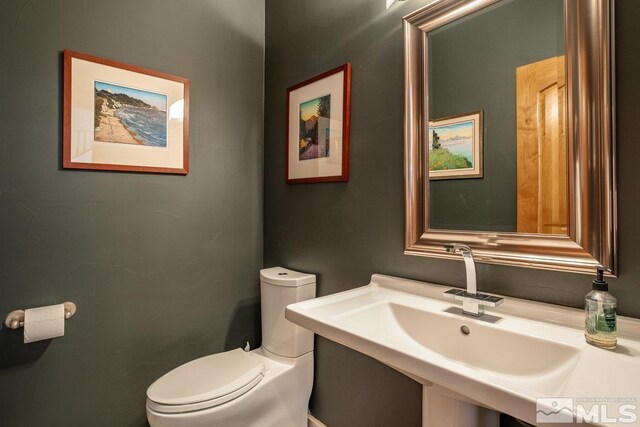 2147 The Back Rd, Glenbrook, NV 89413 - half bath with a sink and toilet