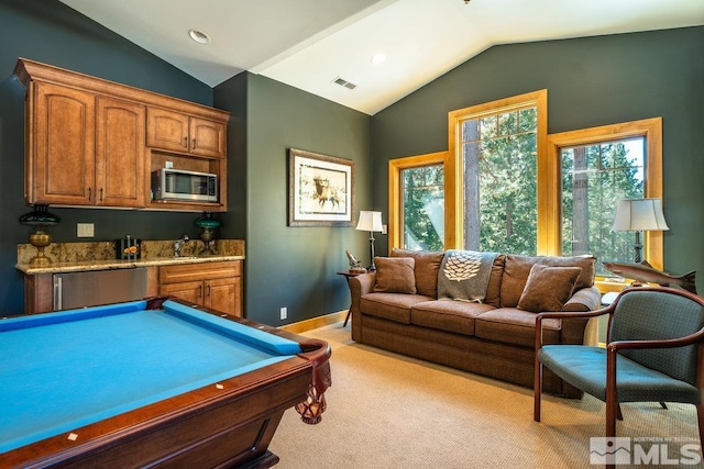 2147 The Back Rd, Glenbrook, NV 89413 - rec room featuring lofted ceiling, light colored carpet, bar, recessed lighting, and baseboards