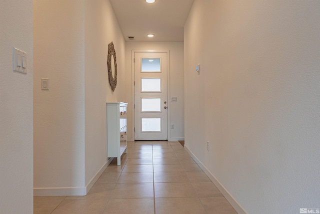 7216 Mustengo Dr, Reno, NV 89506 - entryway featuring light tile patterned floors, baseboards, and recessed lighting