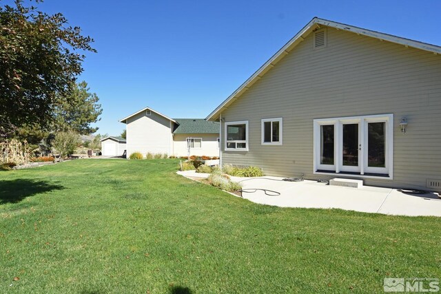 45 Lower Colony Rd, Wellington, NV 89444 - back of property with a yard and a patio area